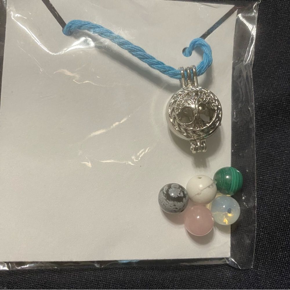 Necklaces with Charm on blue rope thread